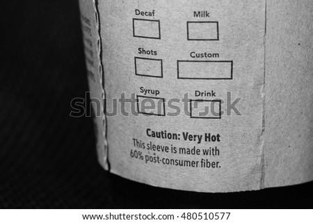 The coffee cup brown color paper label represent the coffee and cold beverage business concept related idea.
