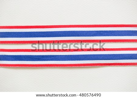 Thai flag ribbon texture decoration closeup blur background