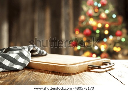 xmas tree blurred background and wooden table of space for your decoration 