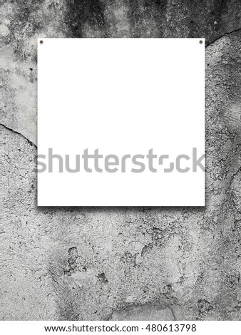 Close-up of one nailed square blank frame on gray cracked concrete wall background