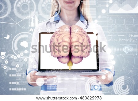 Double Exposure, Doctor holding human organs ( brain) and tablet , gray background. High resolution.