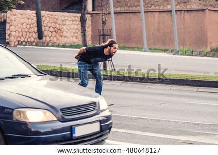 Professional skateboarder riding a skateboard slope on the capital city streets