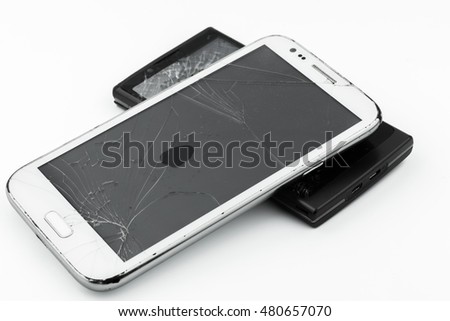 Broken smart phone on white background 
