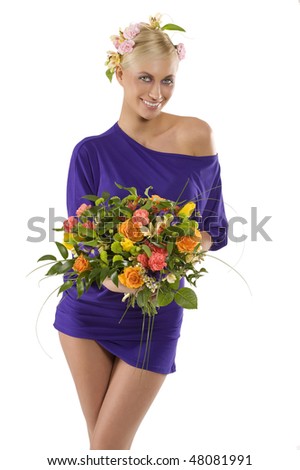 stunning blond woman wearing a violet dress with flower on head and a bouquet
