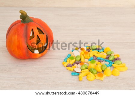 Orange pumpkin halloween with many baubles. 
