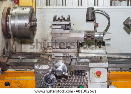 Lathe machine in a workshop. Part of the lathe. Lathe machine is operation on the work shop.