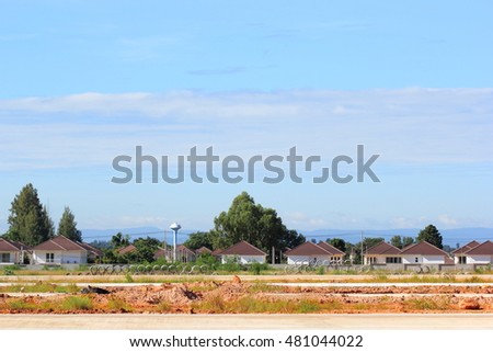 Housing construction site with blue sky background