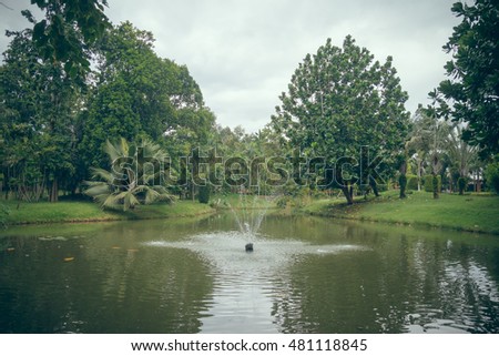 The fountain in the park,Fountain splashes,Thailand,vintage style picture