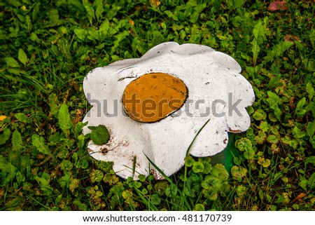 Iron flower on grass