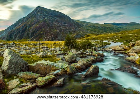 Pen yr Ole Wen and mountain stream in Snowdonia National Park Wales. the seventh highest mountain in Snowdonia and in Wales. It is the most southerly of the Carneddau range.