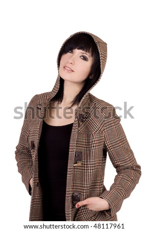 Beautiful young Latvian woman wearing a fall fashion coat