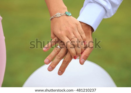 picture of man and woman with wedding rings. Hands with wedding rings