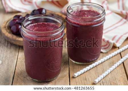 Black forest smoothie with cherry, almond milk and cacao powder in glass jar, horizontal Royalty-Free Stock Photo #481263655