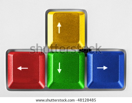 Arrows buttons on computer keyboard - technology background