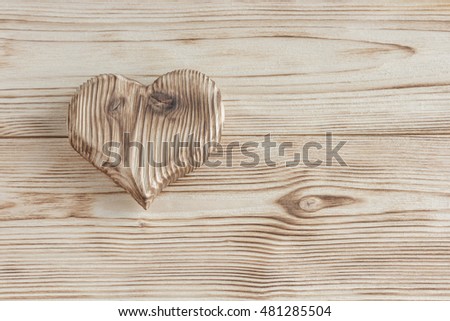 Heart texture of wood lying on the wooden boards won, Valentine's day love wedding. Love for the environment.