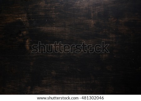 Black wooden background, copy space 