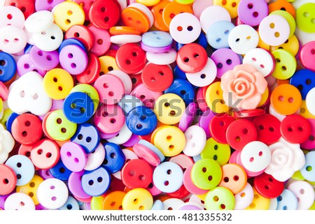 Bright beautiful color buttons for clothes background