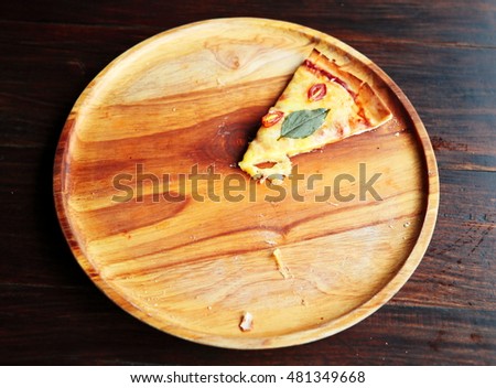   piece of pizza on wooden plate,eat and diet  concept,meal,party,   