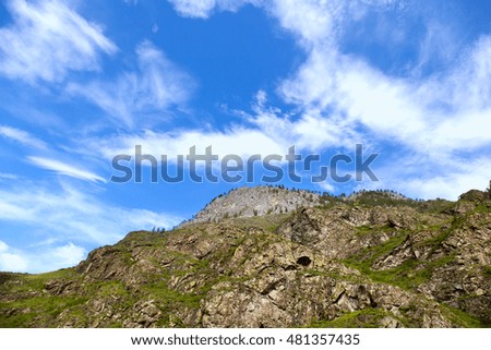 The mountain slopes and blue sky, beautiful natural background