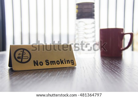 No smoking sign displayed on table
