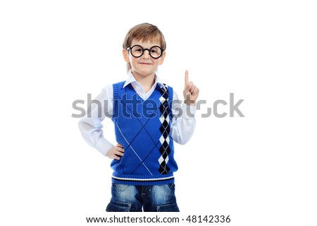 Portrait of a little smiling boy in a funny glasses. Isolated over white background.