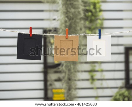 Photo Frames on Rope. background the nature, soft focus