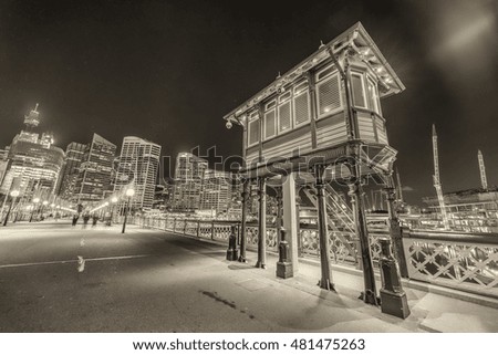 Wooden house at night on Sydney Darling Harbour Bridge.