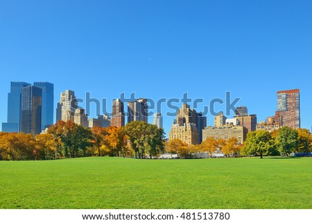Manhattan midtown skyline viewed from central park in Autumn in New York City.