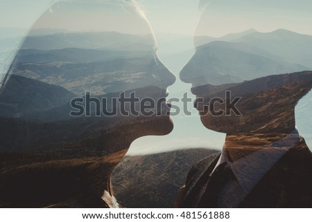 Beautiful reflection of couple in the window