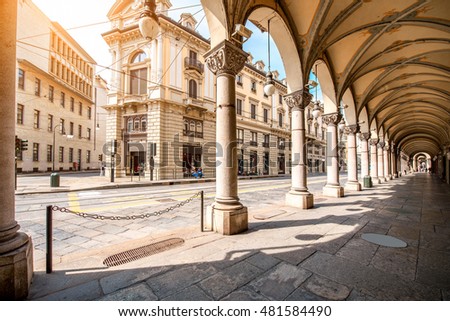 Central street with beautiful buildings in Turin city in Piedmont region in Italy Royalty-Free Stock Photo #481584490