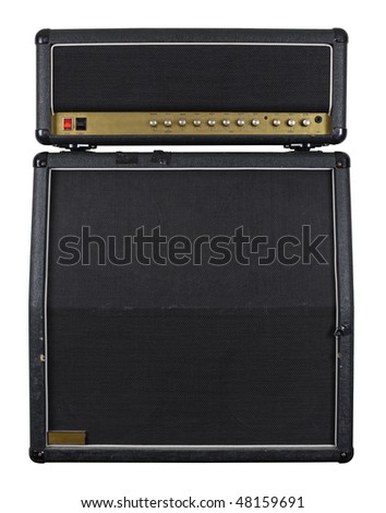 Photograph of the front of an old combo guitar amplifier with speaker cabinet. Royalty-Free Stock Photo #48159691