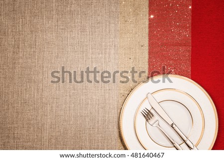 Christmas decoration background over linen background. Horizontal photo taken from above, top view with copy space for text and other web or print design elements.
