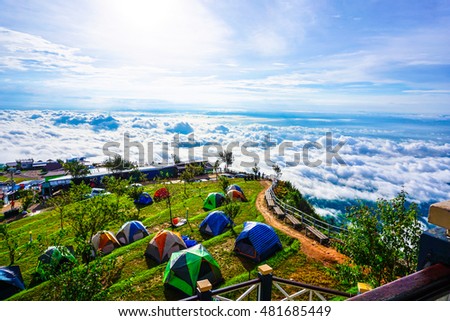 Camp on beautiful and famous travel location The landscape photo, beautiful sea fog in morning time at Phu Tub Berk Viewpoint.Camping Phu Tub berk ; Phetchabun province Thailand; Traveler are crowed. 