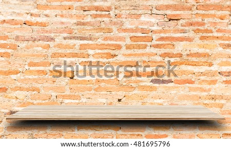 Empty top wooden shelves and brick wall background. For product display