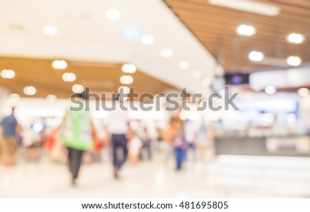 Blurred background, Customer shopping at shopping mall with bokeh light