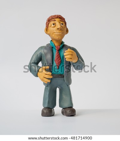 
Photos for your design . Made of plasticine funny man in a suit . Businessman cartoon style Royalty-Free Stock Photo #481714900
