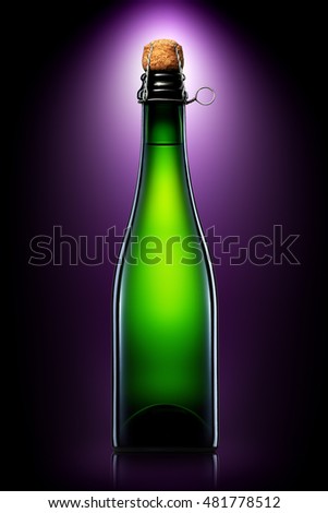 Bottle of beer, cider or champagne with clipping path isolated on black gradient background