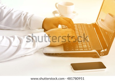 working on laptop, close up of hands of business man