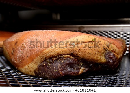 smoked ham in industrial seasoning cell