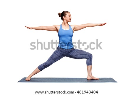 Beautiful sporty fit woman practices  Ashtanga Vinyasa Yoga asana Virabhadrasana 2 - warrior pose 2 isolated on white Royalty-Free Stock Photo #481943404