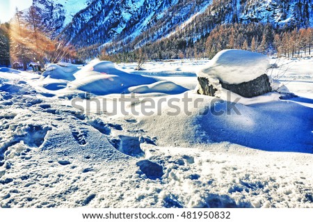 Piedmont, Pragelato. snowy landscape in the sun. Royalty-Free Stock Photo #481950832