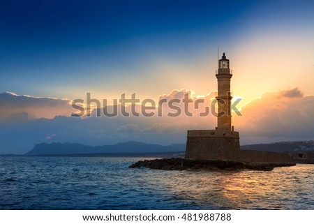 Lighthouse on sunset. Chania, Crete, Greece. Royalty-Free Stock Photo #481988788