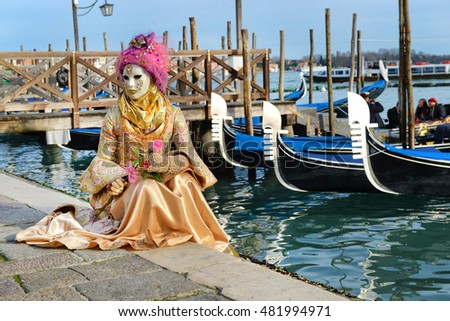 Venice, the lagoon landscape with carnival mask. Royalty-Free Stock Photo #481994971