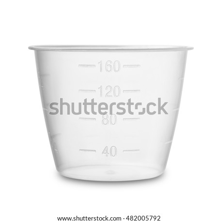Plastic measuring cup isolated on white Royalty-Free Stock Photo #482005792