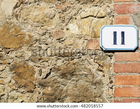 House number 11 sign 