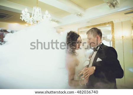 young couple dancing their first dance