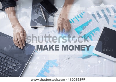 Woman working with documents, Tablet pc and notebook. Make money Concept.