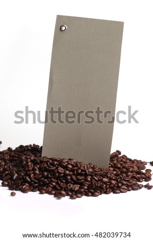 cardboard card sticking out of the coffee beans