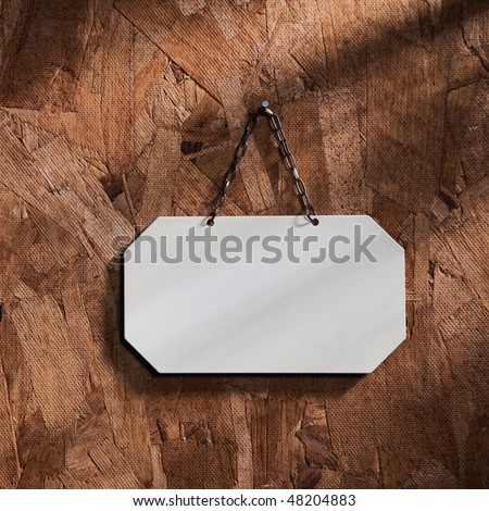 metal signage with string on the texture wood