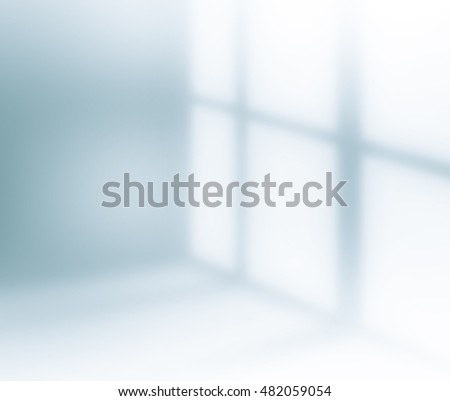Blurred Lights from windows to room filtered blue tones.